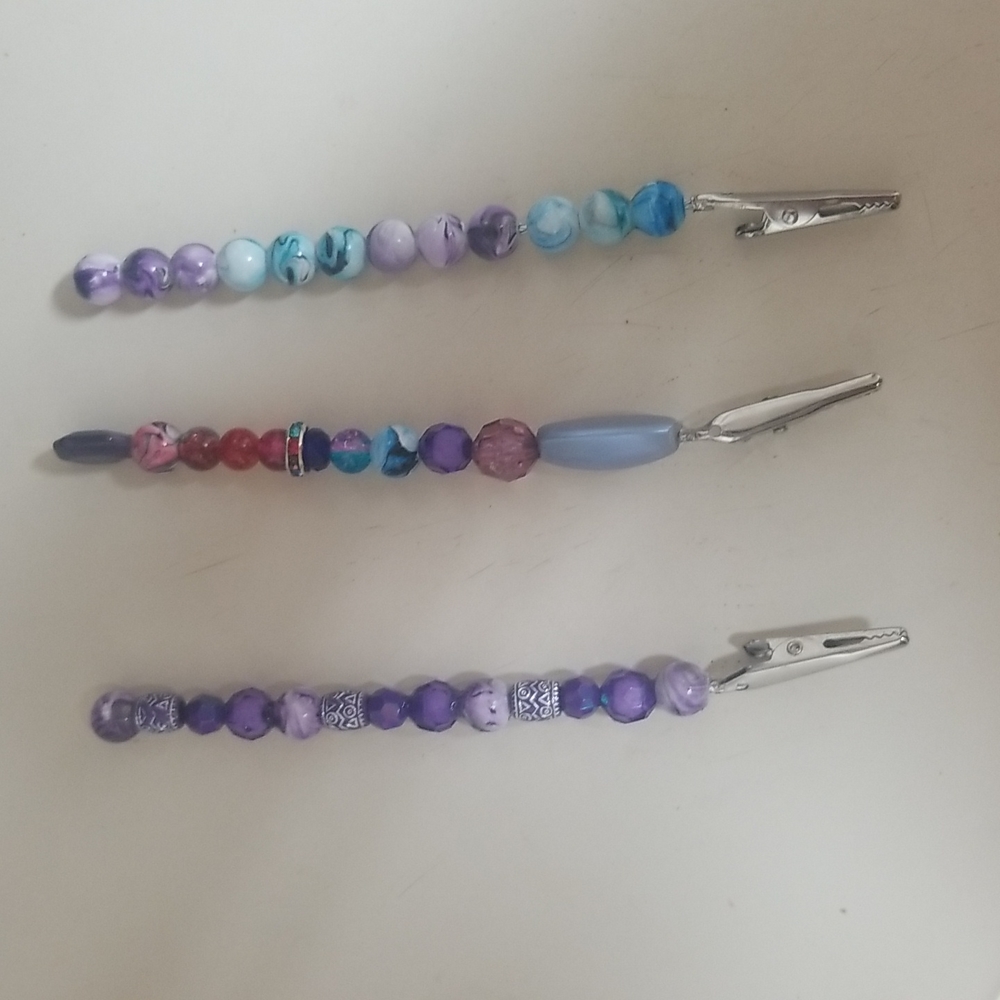 Multi colored atm card holders or roach clips